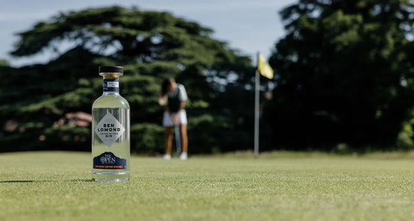 Bottle of Ben Lowndes Gin on a golf course with a blurred background